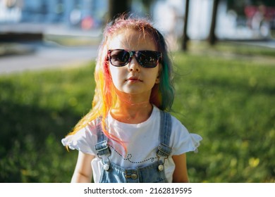 cute caucasian girl with colorful dyed hair. Diversity and creativity concept