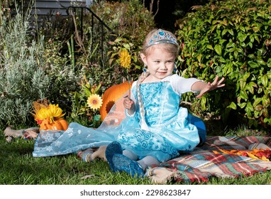 Cute caucasian toddler girl dressed up like a princess with tiara. toddler pretend play. Halloween costume kids - Powered by Shutterstock