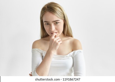 Girl biting lip