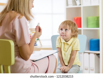 Cute Child Boy At Speech Therapist Session. Private One On One Homeschooling.