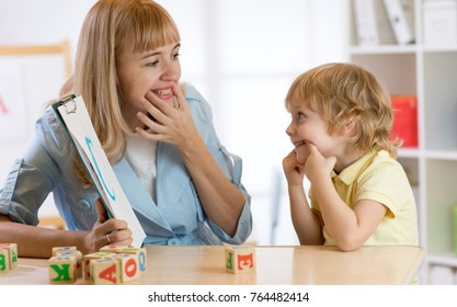 Cute Child Boy At Speech Therapist Office