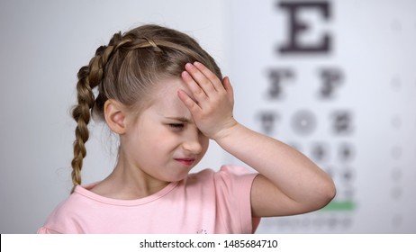 Cute Child Girl Suffering Headache, First Myopia Symptom, Loss Of Eyesight