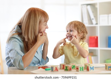 Cute Child Little Boy At Speech Therapist Office