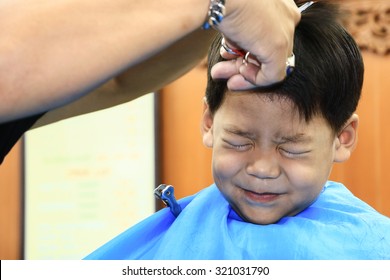 Cute child scared and doesn't like to cut my hair