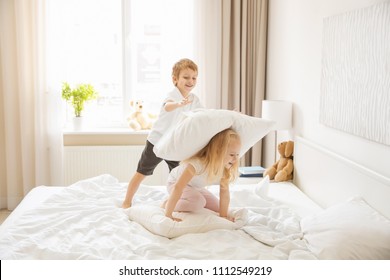 Cute Children Having Fun On Bed Stock Photo (Edit Now) 1112549219