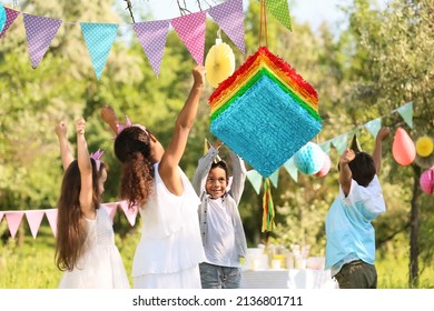 Cute Children At Pinata Birthday Party