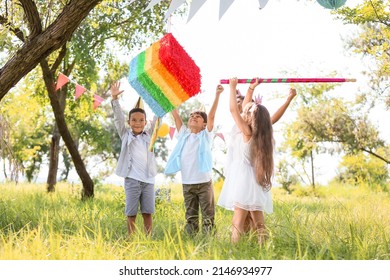 Cute Children At Pinata Birthday Party