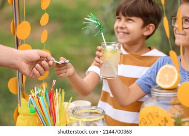 Cute Children Selling Lemonade In Park