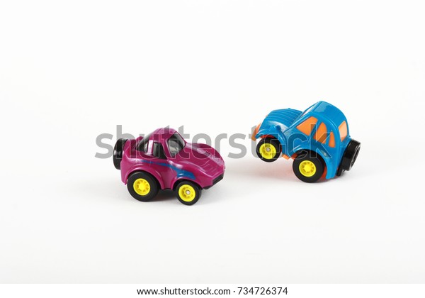 Cute children\'s cars, little cars, colored\
cars, plastic, on white\
background