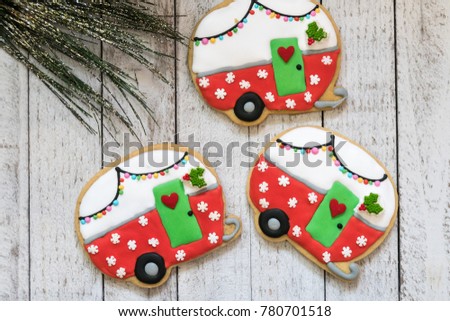 cute christmas camper decorated sugar cookies isolated on a whitewashed wood background with garland - Christmas Camper Decoration cute christmas camper decorated sugar cookies isolated on a whitewashed wood background with garland - Christmas Camper Decoration