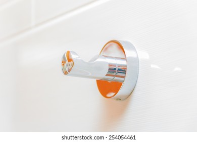 Cute Chrome Towel Hook In White Bathroom