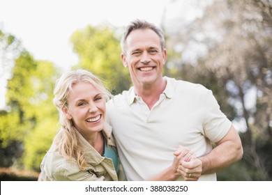 Cute Couple Dancing And Holding Hands Outside