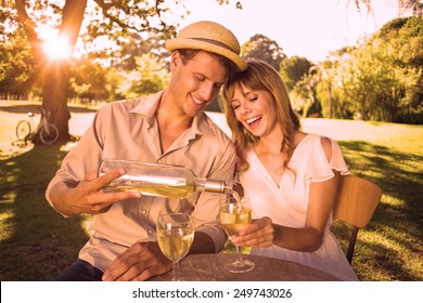 Cute Couple Drinking White Wine Together Outside On A Sunny Day