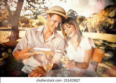 Cute Couple Drinking White Wine Together Outside On A Sunny Day