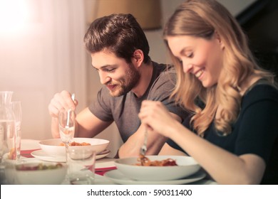 Cute Couple Eating Dinner