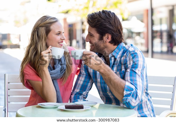 cute-couple-having-coffee-together-600w-300987083.jpg