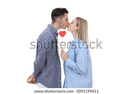 Cute couple with heart isolated on white background
