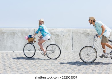 Cute couple on a bike ride on a sunny day - Powered by Shutterstock