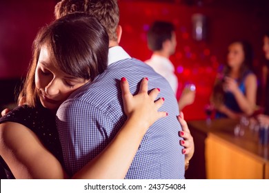 Cute Couple Slow Dancing Together At The Nightclub