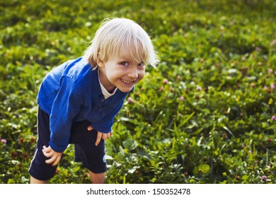 Cute Crafty Little Boy Outdoors, Portrait Of Smiling Child