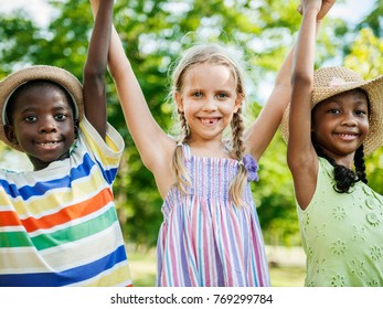 Cute Diverse Kids Playing In The Park