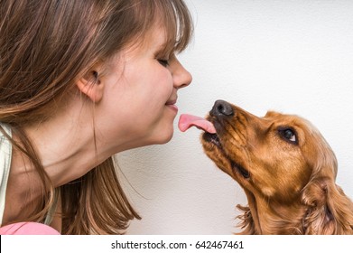 Cute Dog Licking Face Of Woman - True Friend Concept