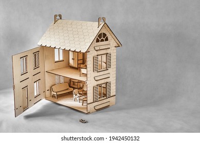 Cute Doll House With Toy Furniture Made Of Plywood Details Cut With Laser Machine Tool Stands With Open Wall On Light Grey