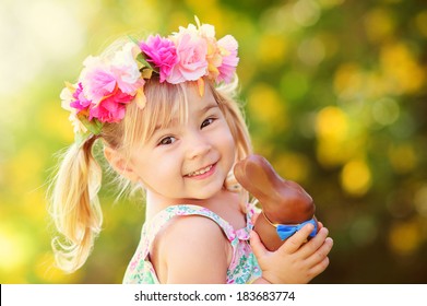 Cute Easter Girl With Chocolate Bunny Outdoor