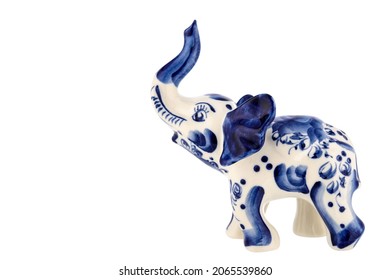 Cute Elephant Figurine Sculpture Porcelain Ceramic Isolated on white background. Cobalt Blue color is traditional folk painting. Decor for interior of premises. - Shutterstock ID 2065539860