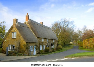 Cute English Cottage With A Thatched Roof