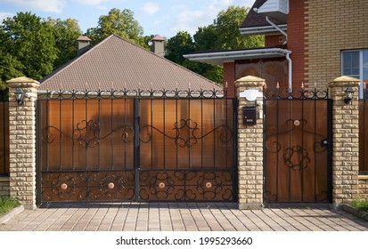 Cute Facade And Wrought Gates Covered Polycarbonate In A Private House