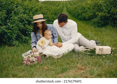 Cute Family Playing In A Summer Field