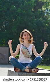 Cute Fanny Pack, Festival Bag, Waist Purse. Smiling Girl Sitting In Lotus Position And Meditating In The Park.