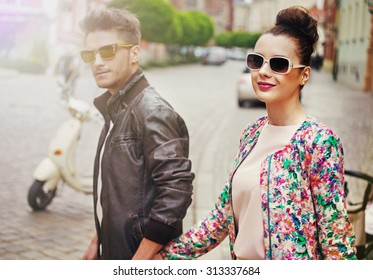 Cute Fashionable Couple On City Street