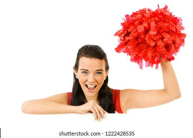 Cute female as an American sports cheerleader, in red and white outfit.  Isolated on white background.