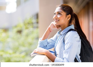 Cute Female College Student Looking Up