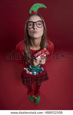 Cute female nerd with small gift
