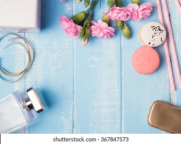 Cute Feminine Objects On Blue Colored Table, Top View