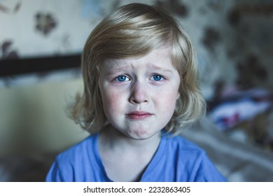 Cute five years old blonde boy with blue eyes and different emotions facial expression. Portrait. Emotions on the face of baby. - Shutterstock ID 2232863405