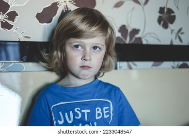 Cute five years old blonde boy with blue eyes and different emotions facial expression. Portrait. Emotions on the face of baby. - Shutterstock ID 2233048547