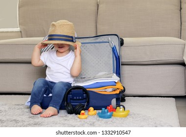 child with suitcase