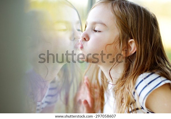 Cute Funny Little Girl Kissing Her Stock Photo Edit Now 297058607