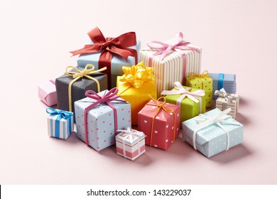 Cute Gift Boxes On Pink Background.  Cute Gift Boxes With Cute Bow.  