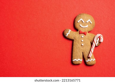 Cute Gingerbread man for Christmas card. Cozy concept of Christmas and winter holidays. Top view. - Powered by Shutterstock