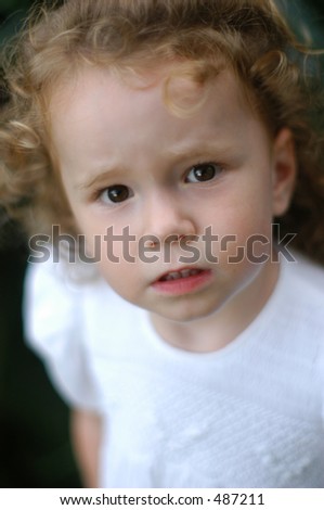 Similar – Foto eines bezaubernden Jungen, der traurig und verärgert war.