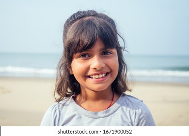 cute girl 7 or 8 years old Asian American mixed enjoying holidays.travel medical insurance concept