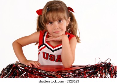 A Cute Girl In A Cheerleading Outfit