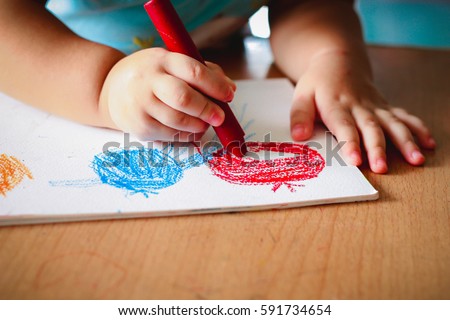 cute girl drawing with colourful crayon ,kids Coloring