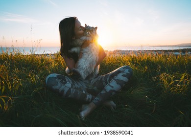 Cute Girl Kisses Her Lovely Funny Beautiful Cat Outdoors At Sunset. Cat With Owner. Love For Cats. 