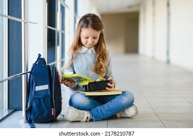 Cute Girl At Lunch Time In School